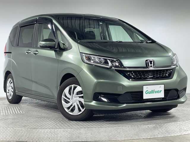 ホンダ フリード G ホンダセンシング 神奈川県 2020(令2)年 1.9万km シルバーミストグリーンM ホンダセンシング/純正ナビ/・BT/フルセグTV/CD/DVD/SD/USB/AM/FM/バックカメラ/両側電動スライドドア/ビルトインETC/シートヒーター(D/N)/アイドリングストップ機能/ステアリングスイッチ/Autoライト/フロントデアイサー/横滑り防止装置/シートリフター/LEDヘッドライト/電動格納ミラー/ウィンカーミラー/スマートキー/プッシュスタートボタン/純正フロアマット/純正ドアバイザー