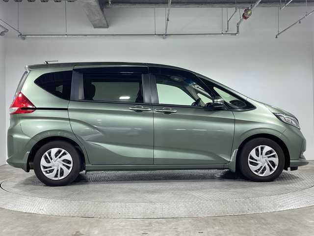 ホンダ フリード G ホンダセンシング 神奈川県 2020(令2)年 1.9万km シルバーミストグリーンM ホンダセンシング/純正ナビ/・BT/フルセグTV/CD/DVD/SD/USB/AM/FM/バックカメラ/両側電動スライドドア/ビルトインETC/シートヒーター(D/N)/アイドリングストップ機能/ステアリングスイッチ/Autoライト/フロントデアイサー/横滑り防止装置/シートリフター/LEDヘッドライト/電動格納ミラー/ウィンカーミラー/スマートキー/プッシュスタートボタン/純正フロアマット/純正ドアバイザー