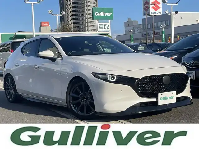 マツダ マツダ３ファストバック 20S Lパッケージ 島根県 2022(令4)年 4.6万km スノーフレイクホワイトパールマイカ ワンオーナー　/純正ナビ　/BOSEシステム /フルセグTV　/ＤＶＤ再生　/Ｂｌｕｅｔｏｏｔｈ接続　/全方位／バック／フロント／サイドカメラ/ETC　/前後ドライブレコーダー　/アダプティブクルーズコントロール/アイドリングストップ　/衝突軽減ブレーキ/前後コーナーセンサー　/本革シート　/運転席メモリーパワーシート/前席シートヒーター/ハンドルヒーター/オートハイビーム／ライト/スマートキー　/純正LEDヘッドライト　/純正１８インチアルミホイール/純正キャリパー/保証書・取扱説明書（本体＋ナビ）/スペアキー１本