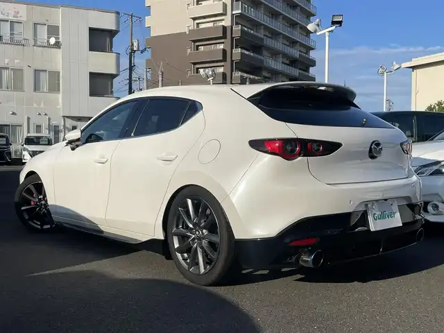 マツダ マツダ３ファストバック 20S Lパッケージ 島根県 2022(令4)年 4.6万km スノーフレイクホワイトパールマイカ ワンオーナー　/純正ナビ　/BOSEシステム /フルセグTV　/ＤＶＤ再生　/Ｂｌｕｅｔｏｏｔｈ接続　/全方位／バック／フロント／サイドカメラ/ETC　/前後ドライブレコーダー　/アダプティブクルーズコントロール/アイドリングストップ　/衝突軽減ブレーキ/前後コーナーセンサー　/本革シート　/運転席メモリーパワーシート/前席シートヒーター/ハンドルヒーター/オートハイビーム／ライト/スマートキー　/純正LEDヘッドライト　/純正１８インチアルミホイール/純正キャリパー/保証書・取扱説明書（本体＋ナビ）/スペアキー１本