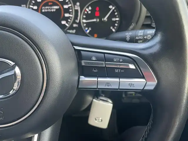 マツダ マツダ３ファストバック 20S Lパッケージ 島根県 2022(令4)年 4.6万km スノーフレイクホワイトパールマイカ ワンオーナー　/純正ナビ　/BOSEシステム /フルセグTV　/ＤＶＤ再生　/Ｂｌｕｅｔｏｏｔｈ接続　/全方位／バック／フロント／サイドカメラ/ETC　/前後ドライブレコーダー　/アダプティブクルーズコントロール/アイドリングストップ　/衝突軽減ブレーキ/前後コーナーセンサー　/本革シート　/運転席メモリーパワーシート/前席シートヒーター/ハンドルヒーター/オートハイビーム／ライト/スマートキー　/純正LEDヘッドライト　/純正１８インチアルミホイール/純正キャリパー/保証書・取扱説明書（本体＋ナビ）/スペアキー１本