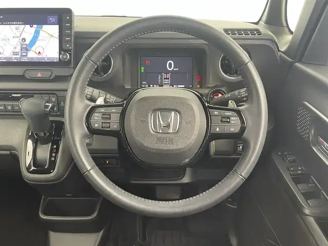 ホンダ Ｎ ＢＯＸ カスタム ターボ 大分県 2023(令5)年 2万km メテオロイドグレーメタリック ホンダセンシング搭載/・衝突軽減ブレーキ/・先行車発進お知らせ機能/・歩行者事故低減ステアリング/・路外逸脱抑制制御機能/・標識認識機能/・渋滞追従機能付アダプティブクルーズコントロール/・車線維持支援システム/・誤発進抑制機能/・後方誤発進抑制機能/・近距離衝突軽減ブレーキ/・急アクセル抑制機能/・パーキングセンサーシステム/・オートハイビーム/マルチビューカメラシステム/純正9型ナビ　型式：LXU-242NBi/・フルセグTV、CD/DVD、BT対応、USB/・AppleCarPlay、AndroidAuto/ステアリングスイッチ/両側電動スライドドア/ETC/ハーフレザーシート/・前席シートヒーター/パドルシフト/電動格納ミラー/純正フロアマット/オートライト/LEDヘッドライト/純正15インチアルミホイール/保証書、取説、スペアキー有