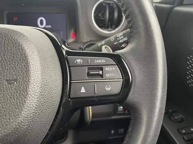 ホンダ Ｎ ＢＯＸ カスタム ターボ 大分県 2023(令5)年 2万km メテオロイドグレーメタリック ホンダセンシング搭載/・衝突軽減ブレーキ/・先行車発進お知らせ機能/・歩行者事故低減ステアリング/・路外逸脱抑制制御機能/・標識認識機能/・渋滞追従機能付アダプティブクルーズコントロール/・車線維持支援システム/・誤発進抑制機能/・後方誤発進抑制機能/・近距離衝突軽減ブレーキ/・急アクセル抑制機能/・パーキングセンサーシステム/・オートハイビーム/マルチビューカメラシステム/純正9型ナビ　型式：LXU-242NBi/・フルセグTV、CD/DVD、BT対応、USB/・AppleCarPlay、AndroidAuto/ステアリングスイッチ/両側電動スライドドア/ETC/ハーフレザーシート/・前席シートヒーター/パドルシフト/電動格納ミラー/純正フロアマット/オートライト/LEDヘッドライト/純正15インチアルミホイール/保証書、取説、スペアキー有