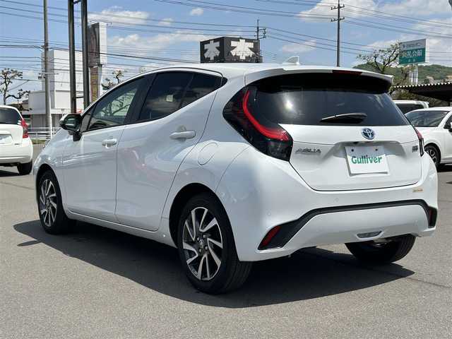 トヨタ アクア Z 岡山県 2021(令3)年 6万km プラチナホワイトパールマイカ 純正10.5インチディスプレイオーディオナビ/　Bluetooth/フルセグ/USB/アラウンドビューモニター/トヨタセーフティセンス/・レーダークルーズコントロール/・プリクラッシュセーフティ/・レーントレーシングアシスト/・オートマチックハイビーム/・ロードサインアシスト/純正16インチアルミホイール/シートヒーター【D+N席】/パワーシート【D席のみ】/１００V電源/スマートキー×2/純正フロアマット/タイプC充電口/衝突被害軽減システム/盗難防止装置/ビルトインETC/前後ドライブレコーダー【TZ-D205W】/レーダー探知機【Z810DR】