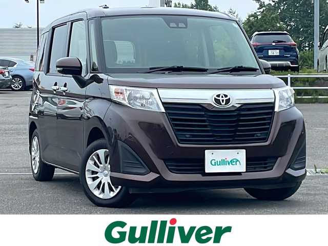 トヨタ ルーミー G 道央・札幌 2018(平30)年 4.5万km プラムブラウンパールクリスタルシャイン ４WD/寒冷地仕様/社外SDナビ/CD/DVD/BT/フルセグ/スマートアシスト/衝突被害軽減ブレーキ/横滑り防止装置/クルーズコントロール/レーンキープアシスト/クリアランスソナー/ビルトインETC/アイドリングストップ/ワイパーデアイサー/両側パワースライドドア/プッシュスタート/スマートキー/ハロゲンヘッドライト/オートライト/オートハイビーム/電動格納ミラー/ウィンカーミラー/純正フロアマット/鉄チンホイール付冬タイヤ積込/165/65/R14/2024年/山8mm