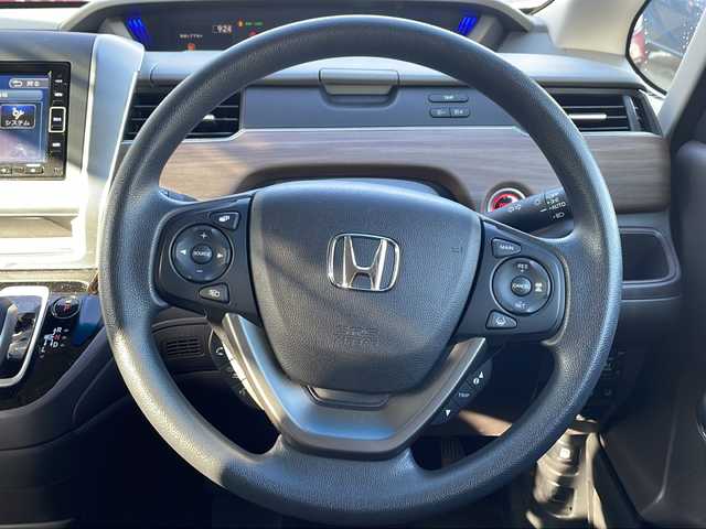 ホンダ フリード ハイブリット G 福島県 2023(令5)年 1.4万km プラチナホワイトパール 4WD 純正ナビ フルセグTV Bluetooth バックカメラ 両側パワースライドドア ホンダンセンシング オートクルーズ ETC LEDヘッドライト レーンキープ オートライト スマートキー