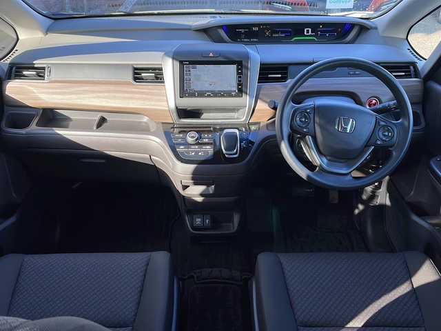 ホンダ フリード ハイブリット G 福島県 2023(令5)年 1.4万km プラチナホワイトパール 4WD 純正ナビ フルセグTV Bluetooth バックカメラ 両側パワースライドドア ホンダンセンシング オートクルーズ ETC LEDヘッドライト レーンキープ オートライト スマートキー