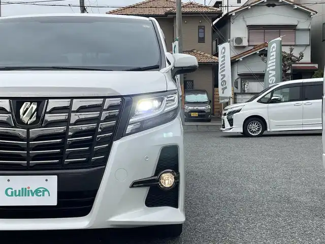 トヨタ アルファード S Aパッケージ タイプブラック 兵庫県 2017(平29)年 5.8万km ホワイトパールクリスタルシャイン ・ワンオーナー/・アルパインBIGX　11インチ（EX11V）/・地デジ/DVD/BT/・バックカメラ/・ウッドコンビステアリング/・ステアリングリモコン/・アルパインカーアロマ/・ナノイーエアコン/・純正18インチAW/・両側パワースライドドア/・パワーバックドア/・クルーズコントロール/・クリアランスソナー/・助手席スーパーロングスライドシート/・オートLEDヘッドランプ/・H30/31/R2/3/4/6/7年ディーラー点検記録簿