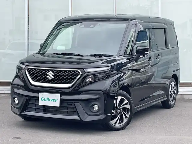 スズキ ソリオ 神奈川県 2021(令3)年 6万km スーパーブラックパール 純正ＳＤナビ　/フルセグＴＶ　/両側パワースライドドア　/全方位カメラ　/追従式クルーズコントロール　/前後ドライブレコーダー　/後方コーナーセンサー　/純正アルミホイール　/スマートキー　/ヘッドアップディスプレイ　/フォグランプ/リアサーキュレーター/衝突被害軽減システム