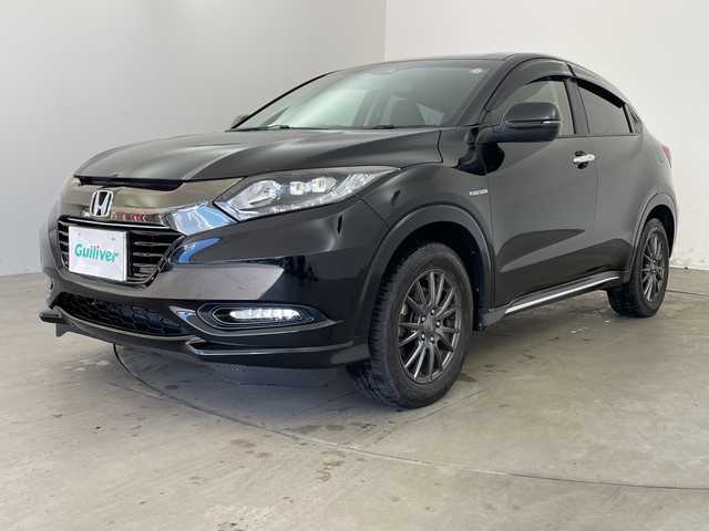 ホンダ ヴェゼル ハイブリッド Z ホンダセンシング 道央・札幌 2017(平29)年 9.3万km クリスタルブラックパール ・Hondaインターナビ/CD/DVD/Bluetooth/USB/・ビルトインETC/・バックカメラ/Honda SENSING/衝突軽減ブレーキ/歩行者事故低減ステアリング/アダプティブクルーズコントロール/車線維持支援システム/路外逸脱抑制機能/誤発進抑制機能/先行車発進お知らせ機能/標識認識機能/・ハーフレザーシート/・前席シートヒーター/・パドルシフト/・LEDヘッドライト/・LEDフォグランプ/・カーテンエアバッグ/・純正17インチアルミホイールセット積み込み/・純正フロアマット/・スマートキー/・スペアキー