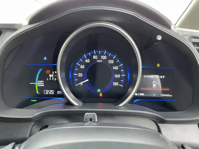 ホンダ フィット ハイブリット Lパッケージ 道北・旭川 2015(平27)年 12.7万km プレミアムホワイトパールⅡ (株)IDOMが運営する【じしゃロン旭川店】の自社ローン対象車両になります。こちらは現金ご利用時の価格です。/自社ローンご希望の方は別途その旨お申付け下さい。/　/・純正ナビ(CD/DVD/フルセグ)/・バックカメラ/・ETC/・レーダーブレーキ/・クルーズコントロール/・ステアリングリモコン/・電動格納ウィンカーミラー/・ミラーヒーター/・プッシュスタート/・スマートキー1個/・オートライト/・現車装着サマータイヤ 社外AW185/60R15