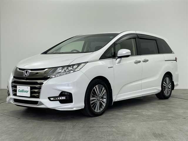 ホンダ オデッセイ ハイブリッド アブソルート・EXホンダセンジング 群馬県 2018(平30)年 2.6万km プラチナホワイトパール フリップダウンモニター　純正メモリーナビ　マルチビューカメラ　アダプティブクルーズコントロール　ＢＳＭ　ＬＥＤライト　ハーフレザー　シートヒーター　純正１７インチＡＷ　ＥＴＣ２．０　スマートキー　禁煙