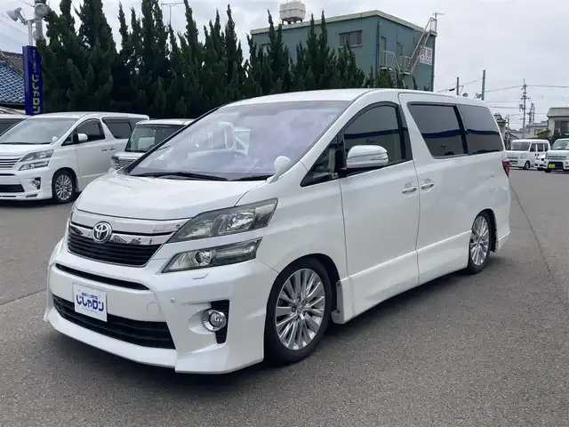トヨタ ヴェルファイア 2．4Z 和歌山県 2012(平24)年 11.1万km ホワイトパールクリスタルシャイン (株)IDOMが運営する【じしゃロン和歌山店】の自社ローン専用車両になります。こちらは現金またはオートローンご利用時の価格です。自社ローンご希望の方は別途その旨お申付け下さい/【じしゃロン個店占有の為　落札禁止】/純正HDDナビ/(NHZN-X62G)/(CD.DVD.HDD.フルセグ.Bluetooth)/バックカメラ/EONONフリップダウンモニター/両側パワースライドドア/ミラー型ドライブレコーダー/コーナーセンサー/アドミレーションリアスポイラー/HKSエアクリーナー/シルクブレイズドアトリム・フロアマット/ボンネットダンパー/車高調/社外カスタマイズ/ヘッドライト・テールライト・ミラー・マフラー/ホット・クールボックス/スカッフプレート/シートカバー