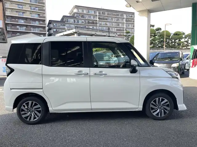 トヨタ ルーミー カスタムG 大阪府 2023(令5)年 1万km パールホワイトⅢ ワンオーナー/純正メモリーナビ/　フルセグTV/　Bluetooth/　DVD再生/　AM/FM/全方位カメラ/バックカメラ/スマートアシストIII/　衝突軽減ブレーキ/　車線逸脱警報/　先行車発信お知らせ/　ふらつき警報/　誤発進抑制制御/　オートハイビーム/レーダークルーズコントロール/純正ＬＥＤライト/スマートキー/両側パワースライドドア/フロントシートヒーター/ドラレコ/スペアキー1本（スマートキー）