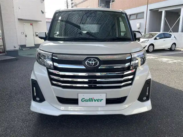 トヨタ ルーミー カスタムG 大阪府 2023(令5)年 1万km パールホワイトⅢ ワンオーナー/純正メモリーナビ/　フルセグTV/　Bluetooth/　DVD再生/　AM/FM/全方位カメラ/バックカメラ/スマートアシストIII/　衝突軽減ブレーキ/　車線逸脱警報/　先行車発信お知らせ/　ふらつき警報/　誤発進抑制制御/　オートハイビーム/レーダークルーズコントロール/純正ＬＥＤライト/スマートキー/両側パワースライドドア/フロントシートヒーター/ドラレコ/スペアキー1本（スマートキー）