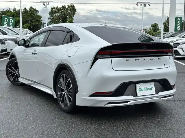 トヨタ プリウス Z 奈良県 2024(令6)年 1.8万km ホワイトパールクリスタルシャイン 純正12.3インチナビ　/フルセグＴＶ　/BT/USB/HDMI/アラウンドビューモニター　/モデリスタエアロ　/ワンオーナー　/デジタルインナーミラー　/レザーシート　/パワーシート　/シートヒーター　/エアシート/ステアリングヒーター　/ＥＴＣ２．０　/ＡＡＣ/衝突被害軽減システム/スマートキー/純正19インチアルミホイール/純正フロアマット/LEDヘッドライト/オートライト/オートマチックハイビーム/置くだけ充電