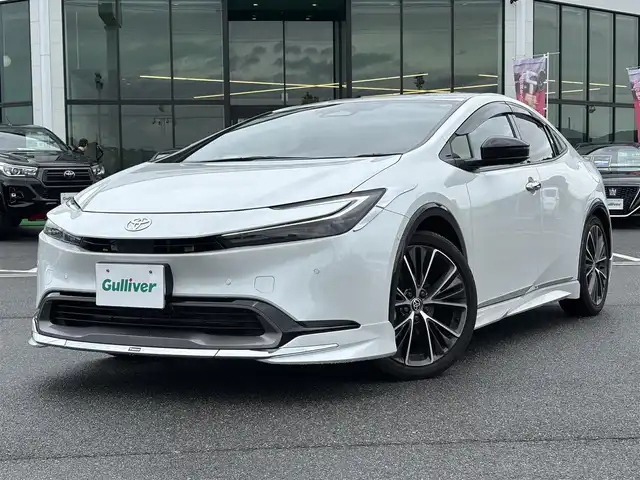 トヨタ プリウス Z 奈良県 2024(令6)年 1.8万km ホワイトパールクリスタルシャイン 純正12.3インチナビ　/フルセグＴＶ　/BT/USB/HDMI/アラウンドビューモニター　/モデリスタエアロ　/ワンオーナー　/デジタルインナーミラー　/レザーシート　/パワーシート　/シートヒーター　/エアシート/ステアリングヒーター　/ＥＴＣ２．０　/ＡＡＣ/衝突被害軽減システム/スマートキー/純正19インチアルミホイール/純正フロアマット/LEDヘッドライト/オートライト/オートマチックハイビーム/置くだけ充電