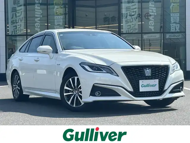 トヨタ クラウン ハイブリッド S 岡山県 2020(令2)年 6.7万km ホワイトパールクリスタルシャイン 純正8インチナビ/バックモニター/D/N席シートヒーター/D/N席パワーシート/トヨタセーフティセンス/・アダプティブクルーズコントロール/・オートマチックハイビーム/・レーンディパーチャアラート/・クリアランスソナー/LEDヘッドライト/LEDフォグランプ/電子パーキングアシスト/プッシュスタート/スマートキー/ビルトインETC2.0/ドライブレコーダー/パワーバックドア