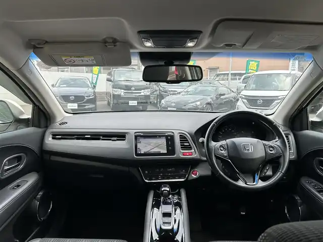 ホンダ ヴェゼル ハイブリッド Z 大分県 2014(平26)年 9.9万km ホワイトオーキッドパール 〇ハーフレザーシート/〇純正メーカーナビ/　CD/DVD/フルセグ/BT/〇バックカメラ/〇ETC/〇シートヒーター/〇クルーズコントロール/〇革巻きステアリング/〇横滑り防止/〇ウインカーミラー/〇トノカバー/〇保証書/〇取扱説明書/〇スペアキー/〇ウインカーミラー