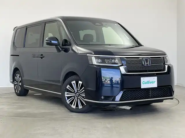 ホンダ ステップワゴン スパーダ eHEV プレミアムライン 新潟県 2023(令5)年 4.6万km ミッドナイトブルービームM 純正11.4インチメモリナビ【LXM-237VFLi】/　フルセグTV/Bluetooth/CD/DVD/USB/HDMI/ホンダセンシング/・衝突被害軽減ブレーキ/・誤発進抑制機能/・後方誤発進抑制機能/・近距離衝突軽減ブレーキ/・歩行者事故低減ステアリング/・路外逸脱抑制機能/・渋滞追従機能付アダプティブクルーズコントロール/・車線維持支援システム/・トラフィックジャムアシスト（渋滞運転支援機能）/・先行車発進お知らせ機能/・標識認識機能/・オートハイビーム/・アダプティブドライビングビーム/ブラインドスポットインフォメーション/15.6インチフリップダウンモニター/全方位モニター/パワーバックドア/前後ドライブレコーダー/両側パワースライドドア/前後コーナーセンサー/ビルトインETC/レザーステアリング/ステアリングスイッチ/パドルシフト