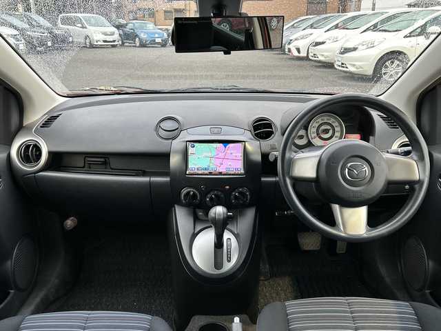 マツダ デミオ 13C 茨城県 2010(平22)年 15.7万km パッションオレンジマイカ ワンオーナー/社外メモリナビ【AVN669HD】/(地デジTV・CD・DVD・BT・ラジオ再生)/オートライト/純正フロアマット/リモコンキー/取扱説明書/保証書