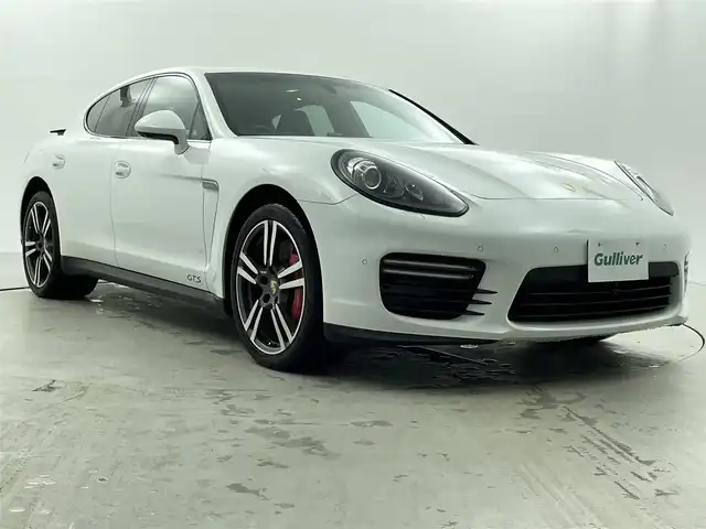 ポルシェ パナメーラ GTS 福井県 2015(平27)年 11.2万km ピュアホワイト スポーツクロノパッケージ/４WD/純正クラリオン製7インチSDナビ/サンルーフ/オプションBOSEサウンド/可動式リアウィング/純正エアサス/純正可変バルブマフラー/スペアキー/純正20インチアルミホイール/前後コーナーセンサー/純正LEDヘッドライト/前席電動シート/全席シートヒーター/ハーフレザーシート/電動リアゲート/スペアキー1本