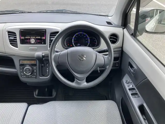 スズキ ワゴンＲ FX 鳥取県 2015(平27)年 3.4万km パールホワイト 社外オーディオ/CD/AUX/USB/ETC/運転席シートヒーター/社外14インチアルミホイール/アイドリングストップ/電動格納ミラー/キーレスキー/フロアマット/ドアバイザー/スペアキー/保証書・取扱説明書