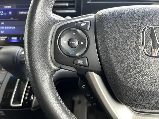 ホンダ ステップワゴン スパーダ ホンダセンシング 静岡県 2019(平31)年 7.4万km プレミアムスパークルブラックパール 8人乗り/純正10インチナビ/（Bluetooth/CD/DVD/USB/SD/FM/AM）/バックカメラ/純正後席モニター/両側電動スライドドア/ETC/デュアルエアコン/プッシュスタート/スマートキー/LEDヘッドライト/追従クルーズコントロール/純正16AW