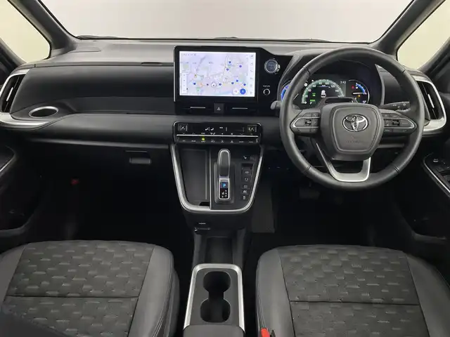 トヨタ ヴォクシー ハイブリッド S－Z 福岡県 2023(令5)年 2万km グリッターブラックガラスフレーク 純正１０．５型ＤＡナビ　/全方位カメラ　/ビルトインＥＴＣ２．０　/トヨタセーフティセンス　/レーダークルーズコントロール　/コーナーセンサー　/衝突軽減ブレーキ　/レーンキープ　/アクセル踏み間違い防止　/ＢＳＭ　/パーキングアシスト　/シートヒーター　/ハーフレザーシート　/両側パワースライドドア　/Wエアコン　/純正アルミホイール