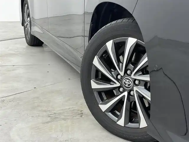 トヨタ ヴォクシー ハイブリッド S－Z 福岡県 2023(令5)年 2万km グリッターブラックガラスフレーク 純正１０．５型ＤＡナビ　/全方位カメラ　/ビルトインＥＴＣ２．０　/トヨタセーフティセンス　/レーダークルーズコントロール　/コーナーセンサー　/衝突軽減ブレーキ　/レーンキープ　/アクセル踏み間違い防止　/ＢＳＭ　/パーキングアシスト　/シートヒーター　/ハーフレザーシート　/両側パワースライドドア　/Wエアコン　/純正アルミホイール