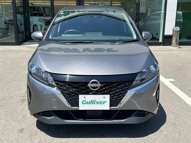 日産 ノート X 愛媛県 2022(令4)年 4.5万km ダークメタルグレー 禁煙車/メーカーオプション純正ナビ フルセグ/Bluetooth/HDMI　/全方位カメラ/バックカメラ/デジタルインナーミラー　/ビルトインETC2.0/衝突被害軽減システム/横滑り防止装置/レーンキープアシスト/オートライト/オートマチックハイビーム/エンジンスタートボタン/スマートキー/ワイヤレス充電/純正フロアマット