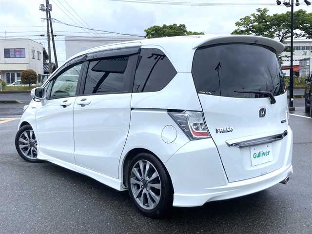 ホンダ フリード ハイブリット ジャストセレクション+ 鳥取県 2014(平26)年 6.7万km ホワイトオーキッドパール 純正ナビ/CD/DVD/BT/USB/バックカメラ/ビルトインETC/前後ドライブレコーダー/両側パワースライドドア/TEIN車高調/クルーズコントロール/キセノンヘットライト/フォグライト/純正16インチアルミホイール/純正エアロパーツ/ハーフレザーシートカバー/スマートキー×２/純正フロアマット/ドアバイザー/スタットレスセット積み込み/(タイヤ溝5部山）