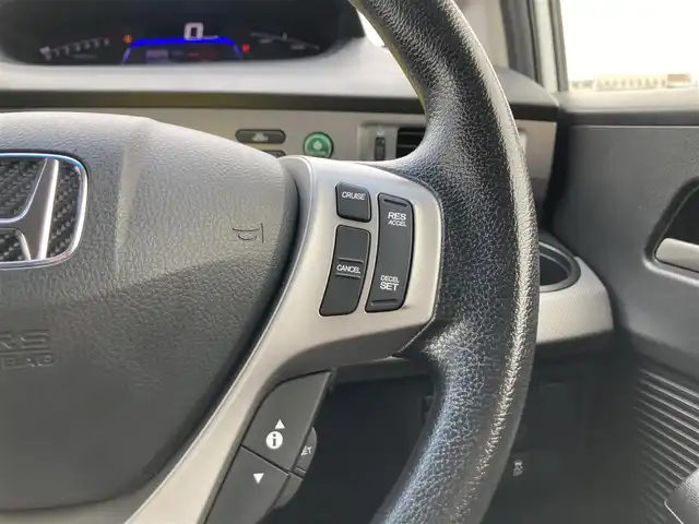 ホンダ フリード ハイブリット ジャストセレクション+ 鳥取県 2014(平26)年 6.7万km ホワイトオーキッドパール 純正ナビ/CD/DVD/BT/USB/バックカメラ/ビルトインETC/前後ドライブレコーダー/両側パワースライドドア/TEIN車高調/クルーズコントロール/キセノンヘットライト/フォグライト/純正16インチアルミホイール/純正エアロパーツ/ハーフレザーシートカバー/スマートキー×２/純正フロアマット/ドアバイザー/スタットレスセット積み込み/(タイヤ溝5部山）
