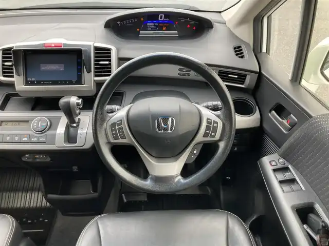 ホンダ フリード ハイブリット ジャストセレクション+ 鳥取県 2014(平26)年 6.7万km ホワイトオーキッドパール 純正ナビ/CD/DVD/BT/USB/バックカメラ/ビルトインETC/前後ドライブレコーダー/両側パワースライドドア/TEIN車高調/クルーズコントロール/キセノンヘットライト/フォグライト/純正16インチアルミホイール/純正エアロパーツ/ハーフレザーシートカバー/スマートキー×２/純正フロアマット/ドアバイザー/スタットレスセット積み込み/(タイヤ溝5部山）