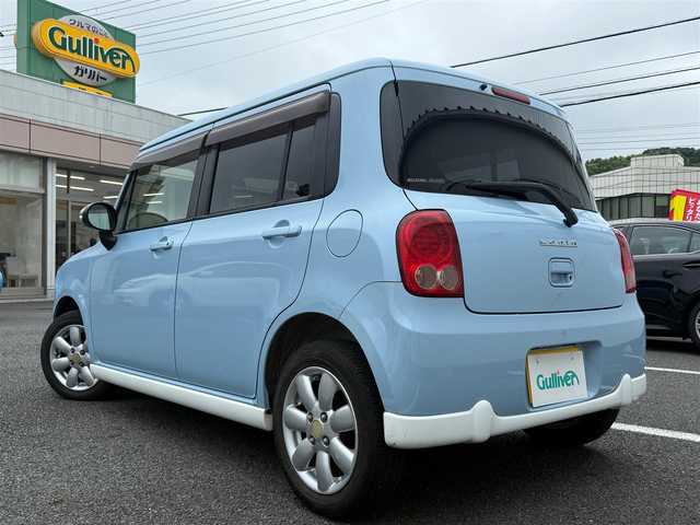 スズキ ラパン T 静岡県 2011(平23)年 9万km ライトブルーⅡ スマートキー×2/プッシュスタート/純正CDオーディオ/純正14インチアルミホイール/ウィンカードアミラー/専用レザー調シートカバー/WエアB＋ABS/純正ドアバイザー/フロアマット/取説+保証書