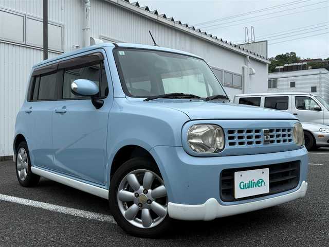 スズキ ラパン T 静岡県 2011(平23)年 9万km ライトブルーⅡ スマートキー×2/プッシュスタート/純正CDオーディオ/純正14インチアルミホイール/ウィンカードアミラー/専用レザー調シートカバー/WエアB＋ABS/純正ドアバイザー/フロアマット/取説+保証書