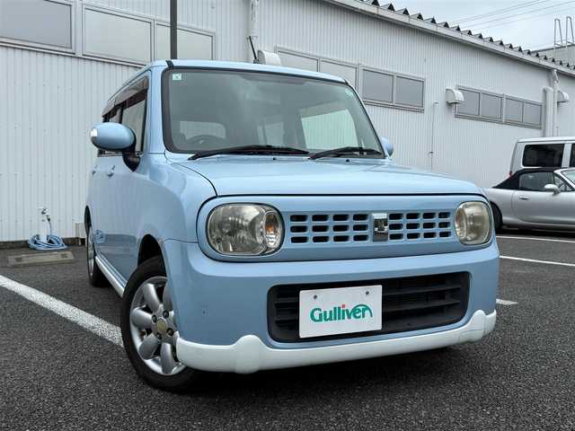 スズキ ラパン T 静岡県 2011(平23)年 9万km ライトブルーⅡ スマートキー×2/プッシュスタート/純正CDオーディオ/純正14インチアルミホイール/ウィンカードアミラー/専用レザー調シートカバー/WエアB＋ABS/純正ドアバイザー/フロアマット/取説+保証書