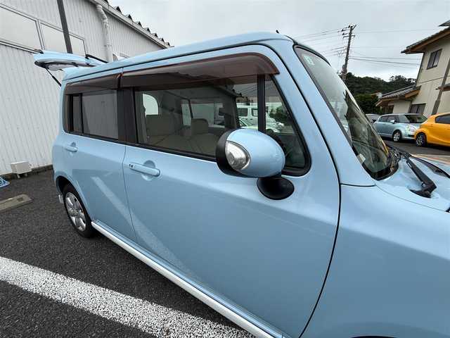 スズキ ラパン T 静岡県 2011(平23)年 9万km ライトブルーⅡ スマートキー×2/プッシュスタート/純正CDオーディオ/純正14インチアルミホイール/ウィンカードアミラー/専用レザー調シートカバー/WエアB＋ABS/純正ドアバイザー/フロアマット/取説+保証書