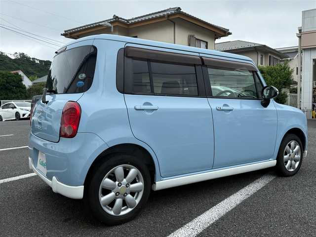 スズキ ラパン T 静岡県 2011(平23)年 9万km ライトブルーⅡ スマートキー×2/プッシュスタート/純正CDオーディオ/純正14インチアルミホイール/ウィンカードアミラー/専用レザー調シートカバー/WエアB＋ABS/純正ドアバイザー/フロアマット/取説+保証書
