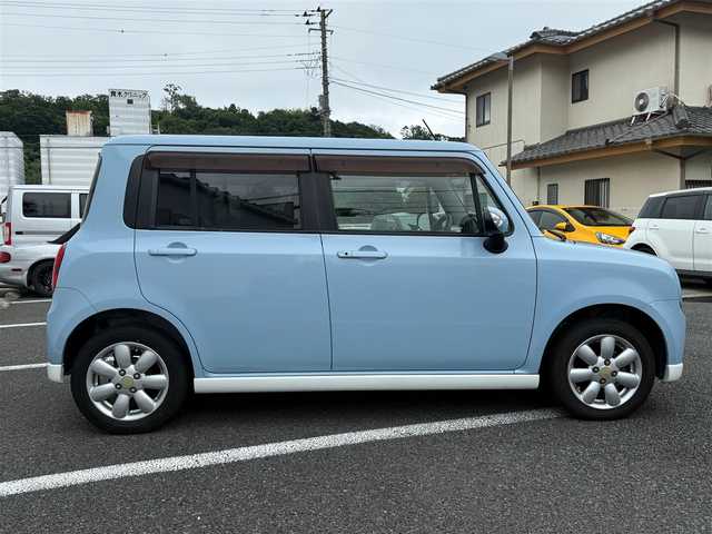 スズキ ラパン T 静岡県 2011(平23)年 9万km ライトブルーⅡ スマートキー×2/プッシュスタート/純正CDオーディオ/純正14インチアルミホイール/ウィンカードアミラー/専用レザー調シートカバー/WエアB＋ABS/純正ドアバイザー/フロアマット/取説+保証書