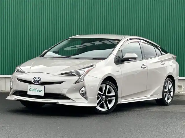トヨタ プリウス A プレミアム　ツーリングセレ 宮城県 2016(平28)年 6万km スティールブロンドM 寒冷地仕様/・デアイサー/・リアフォグランプ/＝＝＝/エアロ（F/S/R）/セーフティセンス/・プリクラッシュセーフティ/・レーンディパーチャーアラート/・オートマチックハイビーム/・レーダークルーズコントロール/ブラインドスポットモニター/インテリジェントクリアランスソナー/シンプルインテリジェントパーキングアシスト/ヘッドアップディスプレイ/純正9インチナビ（DSZT-YC4T）/・CD/DVD/・Bluetooth/・フルセグTV/バックカメラ/ビルトインETC/ドライブレコーダー/AC100V/1500W/本革シート/シートヒーター/運転席パワーシート/革巻きステアリング/ステアリングスイッチ/LEDヘッドランプ/フォグランプ/オートライト/スマートキー＆プッシュスタート/電動格納ミラー/純正17インチAW/純正フロアマット/純正ドアバイザー/トノカバー/W/サイド/カーテンエアバッグ