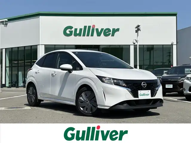日産 ノート X 愛媛県 2022(令4)年 4.6万km ピュアホワイトパール 禁煙車/登録時走行距離：46013km/メーカーOP純正ナビ/フルセグTV/Bluetooth/全方位カメラ/デジタルインナーミラー/ビルトインETC/衝突軽減システム/横滑り防止装置/レーンキープアシスト/レーダークルーズコントロール/エンジンスタートボタン/スマートキー/純正フロアマット/BSM/ワイヤレス充電