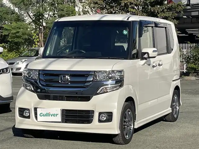 ホンダ Ｎ ＢＯＸ カスタム G SSパッケージ 熊本県 2015(平27)年 6.3万km プレミアムホワイトパールⅡ ワンオーナー/CTBA/プッシュスタート/純正ナビ/（CD・DVD・フルセグTV・BTオーディオ・SD）/バックカメラ/純正14インチAW/両側パワースライドドア/ディスチャージヘッドライト/オートライト/フォグライト/横滑り防止装置/ウィンカーミラー/純正フロアマット/純正ドアバイザー/新車保証書/取扱説明書/スマートスペアキー×1本