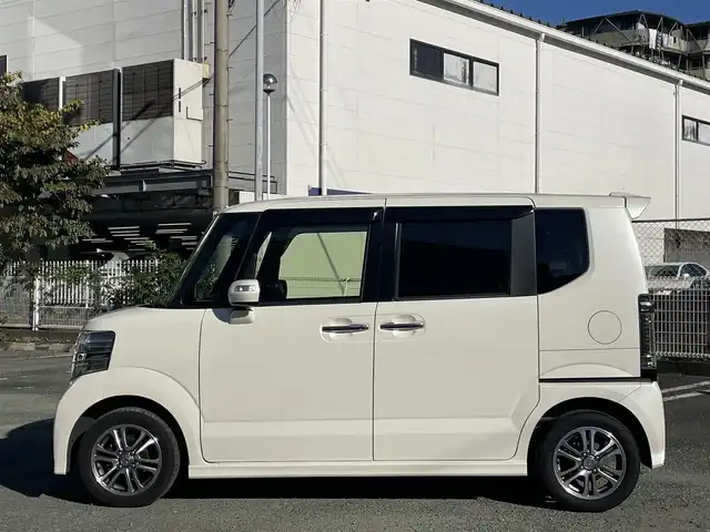 ホンダ Ｎ ＢＯＸ カスタム G SSパッケージ 熊本県 2015(平27)年 6.3万km プレミアムホワイトパールⅡ ワンオーナー/CTBA/プッシュスタート/純正ナビ/（CD・DVD・フルセグTV・BTオーディオ・SD）/バックカメラ/純正14インチAW/両側パワースライドドア/ディスチャージヘッドライト/オートライト/フォグライト/横滑り防止装置/ウィンカーミラー/純正フロアマット/純正ドアバイザー/新車保証書/取扱説明書/スマートスペアキー×1本