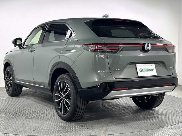 ホンダ ヴェゼル ハイブリッド e:HEV Z 広島県 2025(令7)年 0.1万km未満 Ｄグリーン 登録済未使用車（50km）/Honda CONNECT 9型ディスプレー/・メモリナビ/・AppleCarPlay/AndroidAuto/・フルセグTV/ハンズフリーパワーバックドア/ハーフレザーシート/シートヒーター/ステアリングヒーター/ダウンヒルアシストコントロール/減速セレクター/ホンダセンシング/・衝突軽減ブレーキ/・レーンキープアシスト/・アダプティブクルーズコントロール/・アダプティブドライビングビーム/・パーキングセンサー/・ブラインドスポットモニター/・誤発進抑制機能/ETC2.0/おくだけ充電/USB入力端子