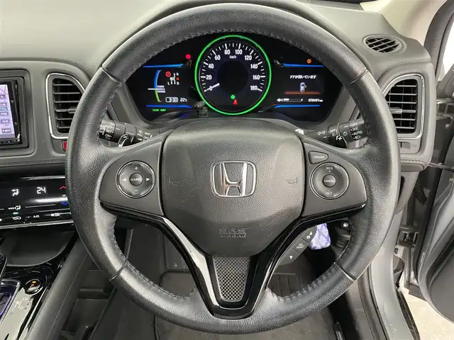 ホンダ ヴェゼル ハイブリッド X Lパッケージ 富山県 2014(平26)年 7.9万km ティンテッドシルバーM 4WD/ワンオーナー/寒冷地仕様/純正ナビ（AM/FM/CD/DVD/USB/BT）/フルセグTV/クルーズコントロール/オートライト/LEDヘッドライト/横滑り防止装置/ハーフレザーシート/前席シートヒーター/ドライブレコーダー/パドルシフト/スマートキー×２/プッシュスタート/純正フロアマット