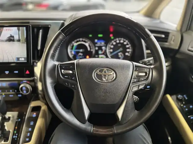 トヨタ アルファードハイブリット G 京都府 2019(平31)年 3.9万km ホワイトパールクリスタルシャイン ワンオーナー/4WD/純正10インチメモリーナビ、地デジ、Bluetooth/純正12インチ後部フリップダウンモニター/デジタルインナーミラー/本革シート（前席エアーシート/シートヒーター）/前席パワーシート/3眼LEDヘッドランプ/ビルトイン2.0ETC/両側パワースライドドア /パワーバックドア/運転席メモリーシート/USB端子/トヨタセーフティセンス/・プリクラッシュセーフティ/・ロードサインアシスト/・レーダークルーズコントロール/・オートマチックハイビーム/スペアキー/保証書/記録簿R4、R6