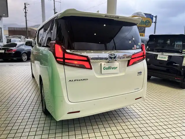 トヨタ アルファードハイブリット G 京都府 2019(平31)年 3.9万km ホワイトパールクリスタルシャイン ワンオーナー/4WD/純正10インチメモリーナビ、地デジ、Bluetooth/純正12インチ後部フリップダウンモニター/デジタルインナーミラー/本革シート（前席エアーシート/シートヒーター）/前席パワーシート/3眼LEDヘッドランプ/ビルトイン2.0ETC/両側パワースライドドア /パワーバックドア/運転席メモリーシート/USB端子/トヨタセーフティセンス/・プリクラッシュセーフティ/・ロードサインアシスト/・レーダークルーズコントロール/・オートマチックハイビーム/スペアキー/保証書/記録簿R4、R6