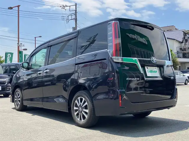 トヨタ エスクァイア ハイブリッド Gi 静岡県 2018(平30)年 4.9万km スパークリングブラックパールクリスタルシャイン エンジンスタートボタン/パワーステアリング/パワーウィンドウ/アイドリングストップ/スマートキー/Wオートエアコン/クルーズコントロール/後席用モニター/ETC/USB入力端子/バックカメラ/メモリナビ（CD.DVD.BT.フルセグ）/3列シート/ウォークスルー/純正フロアマット/純正アルミホイール/D席N席シートヒーター/両側パワースライドドア/ABS/レーンキープアシスト/オートライト/オートマチックハイビーム/LEDライト/Wエアバック/衝突軽減システム