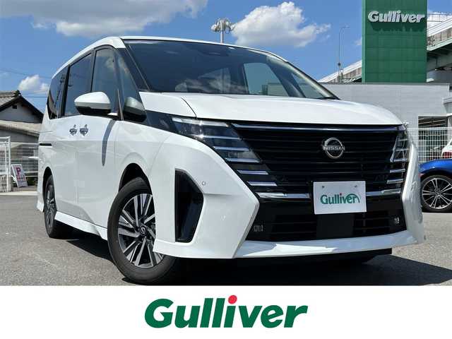 日産 セレナ ハイウェイスター V 愛知県 2023(令5)年 5.3万km プリズムホワイト 純正ナビ/（AM/FM/BT/USB)/フルセグTV/アラウンドビューモニター/ETC2.0/スマートルームミラー/ドライブレコーダー/ワイヤレス充電/両側パワースライドドア/純正16インチAW/LEDヘッドライト/フォグランプ/革巻きステアリング